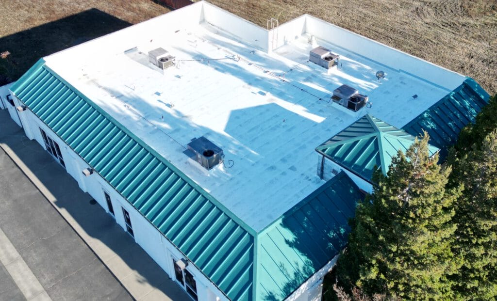 Silicone coating roof replacement new roof re-roof roofing contractor roofing company roofer reroof